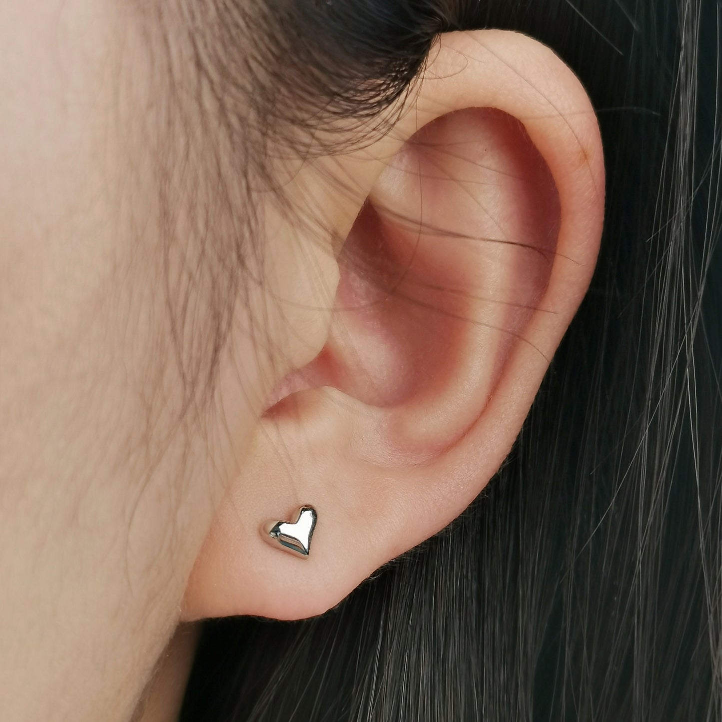 Tiny Heart Stud Earrings in Sterling Silver