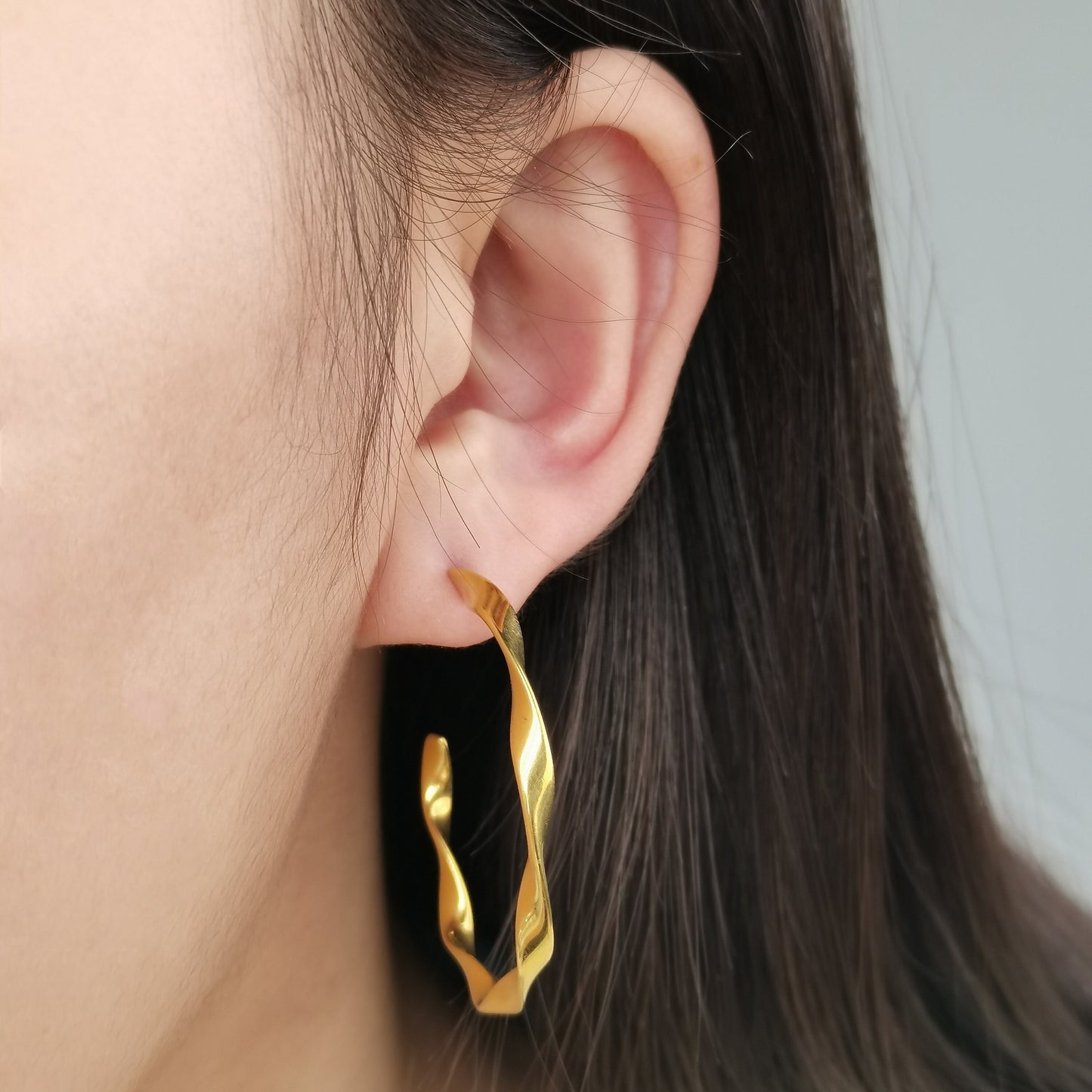 C-shaped Gold Twisted Hoop Earrings