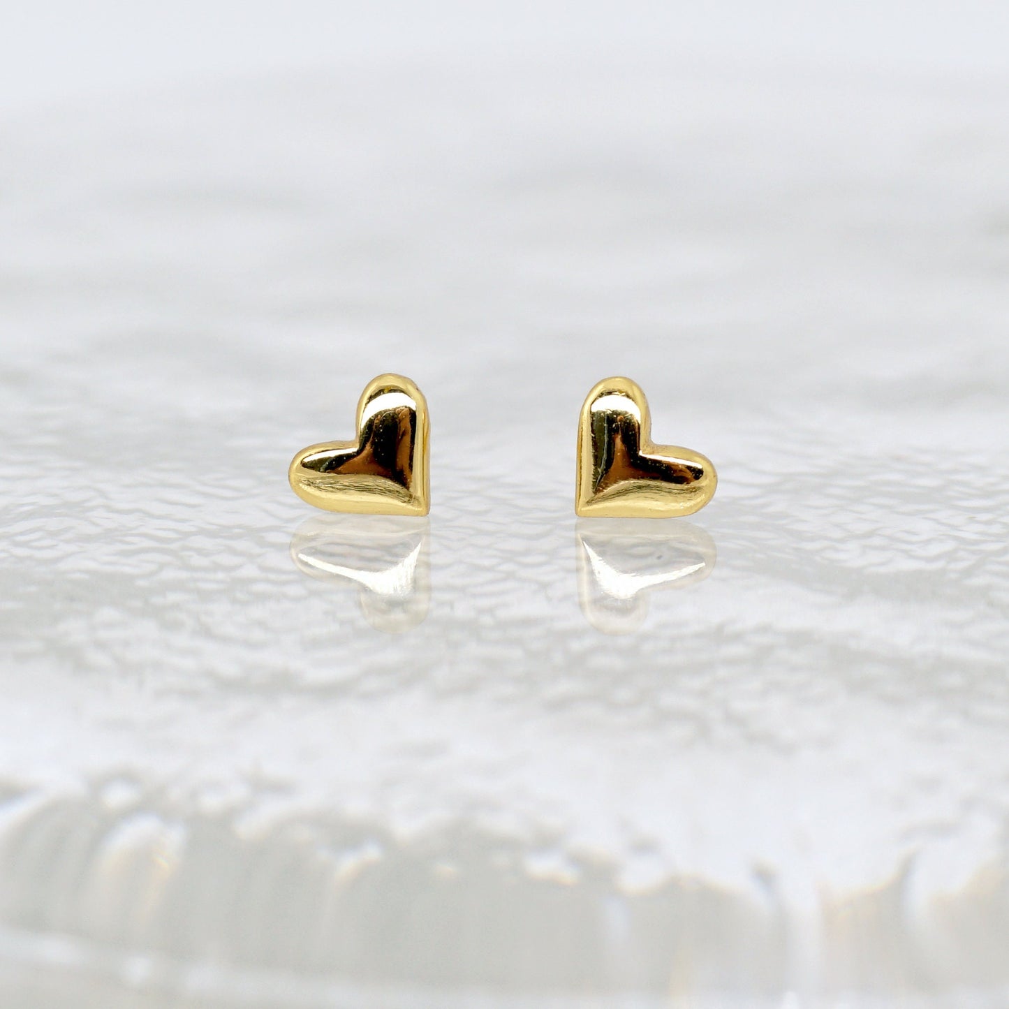 Tiny Heart Stud Earrings in Sterling Silver